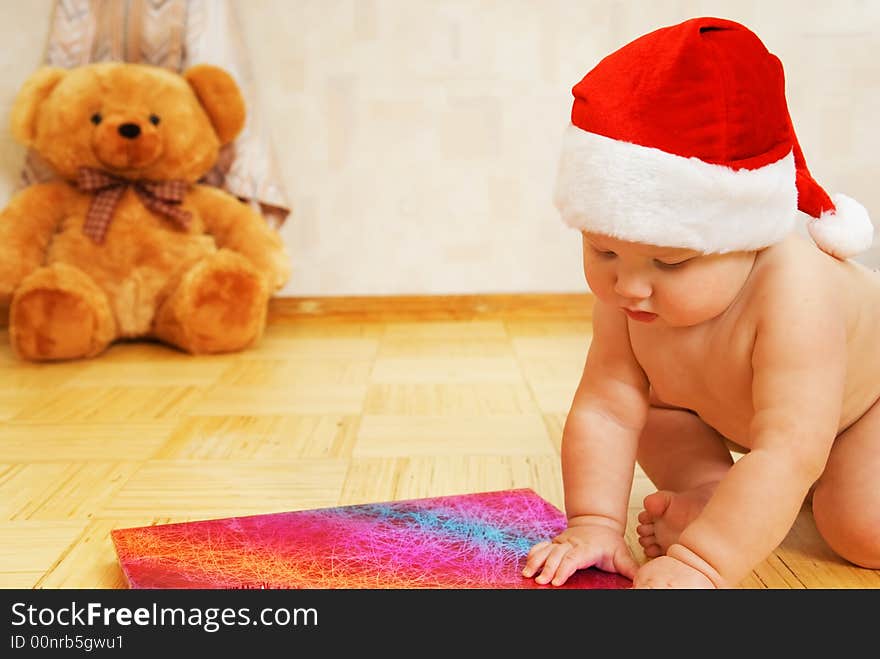 Adorable toddler in Christmas hat