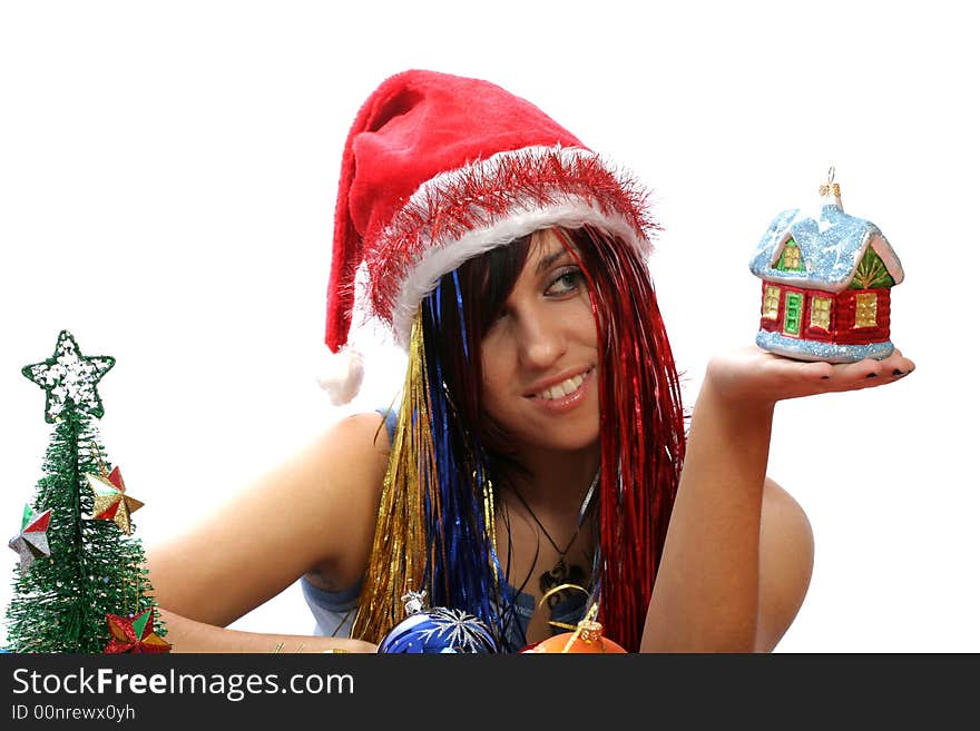 Christmas girl with new home toy, isolated on white