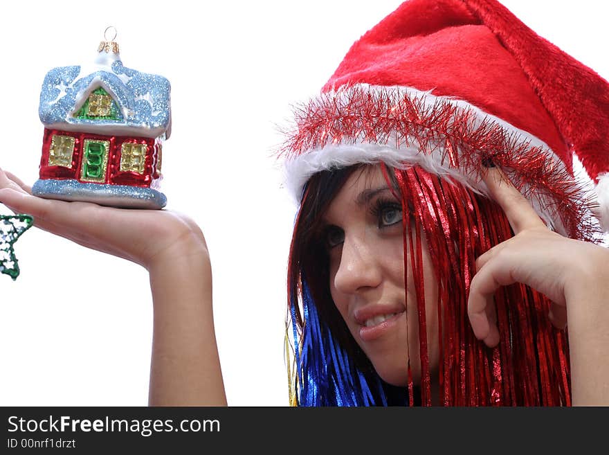 Christmas girl with new home, isolated on white