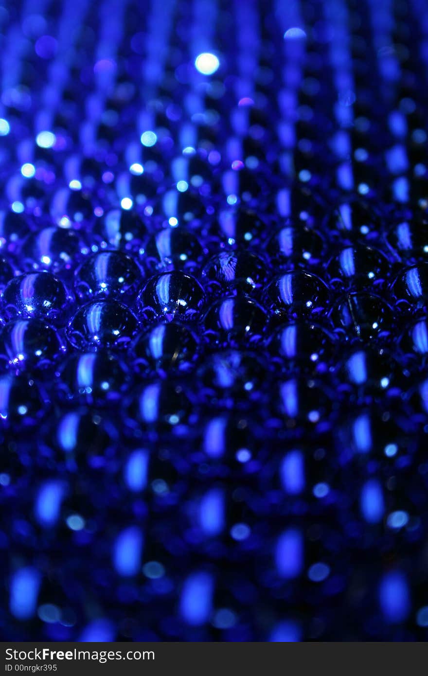 Blue glass beads in perspective. Blue glass beads in perspective