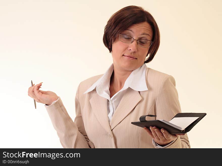 White businesswoman with notepad and pen. White businesswoman with notepad and pen