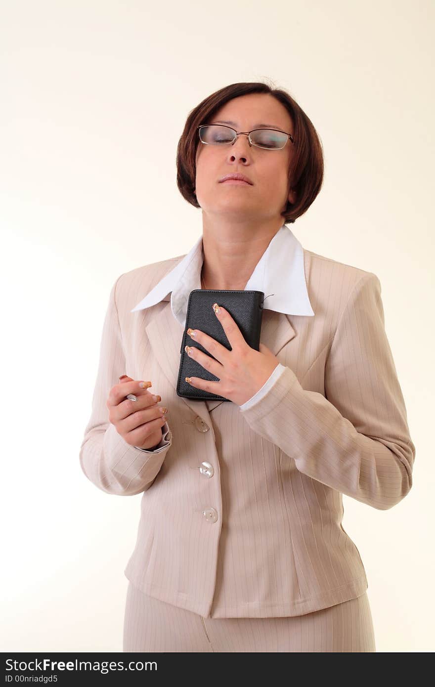 White businesswoman with notepad and ballpen. White businesswoman with notepad and ballpen