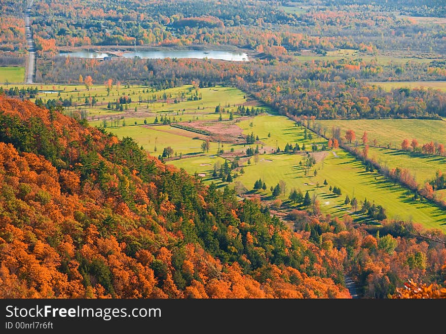 Golf course viewed from above in fall nature. Golf course viewed from above in fall nature