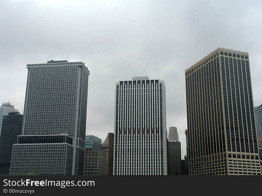 A picture of three skyscrapers nearly equal in height. A picture of three skyscrapers nearly equal in height