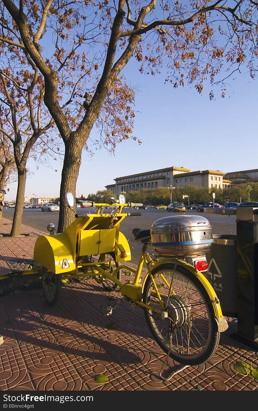 An unusual pedal powered vehicle on the street in Beijing. An unusual pedal powered vehicle on the street in Beijing.