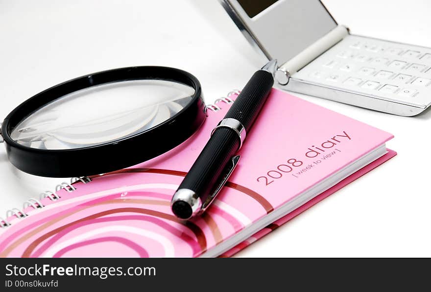 Focus a diary book image on the white background. Focus a diary book image on the white background