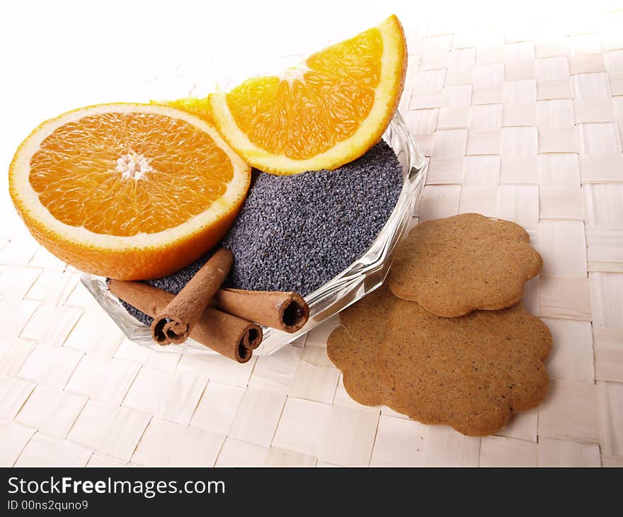 Oranges, cinnamon, poppy and cookies