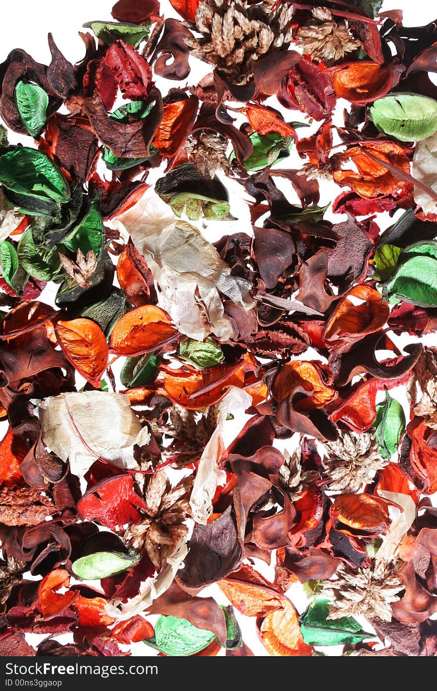 Frame filling shot of pot pourri leaves on backlit background,  great and colorful background