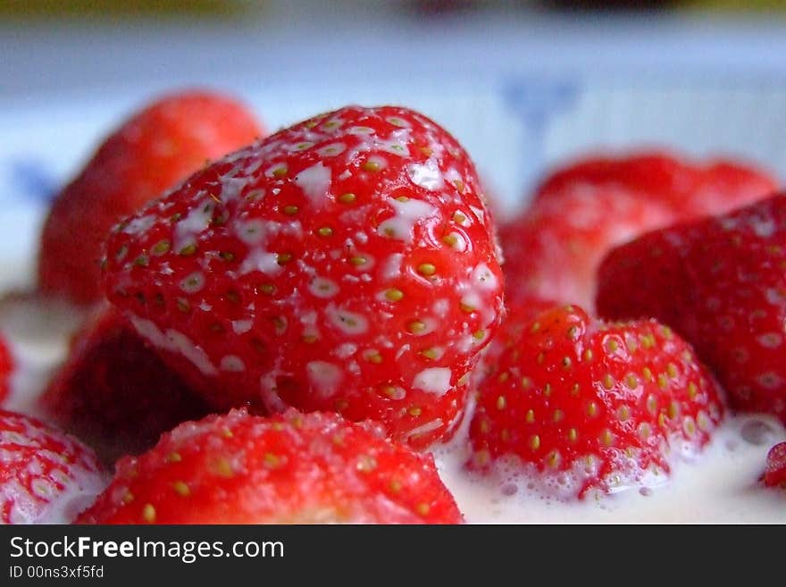 Upclose strawberry with cream, a summer delight