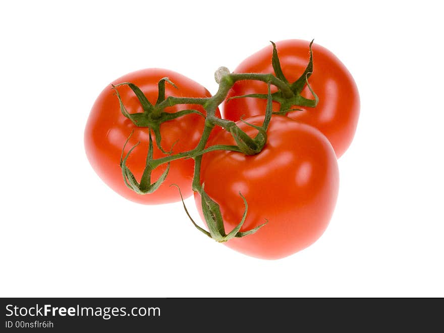 Fresh bunch of tomatos isolated on a white background