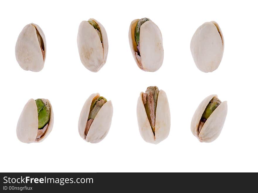 Fresh pistachio nuts isolated on a white background