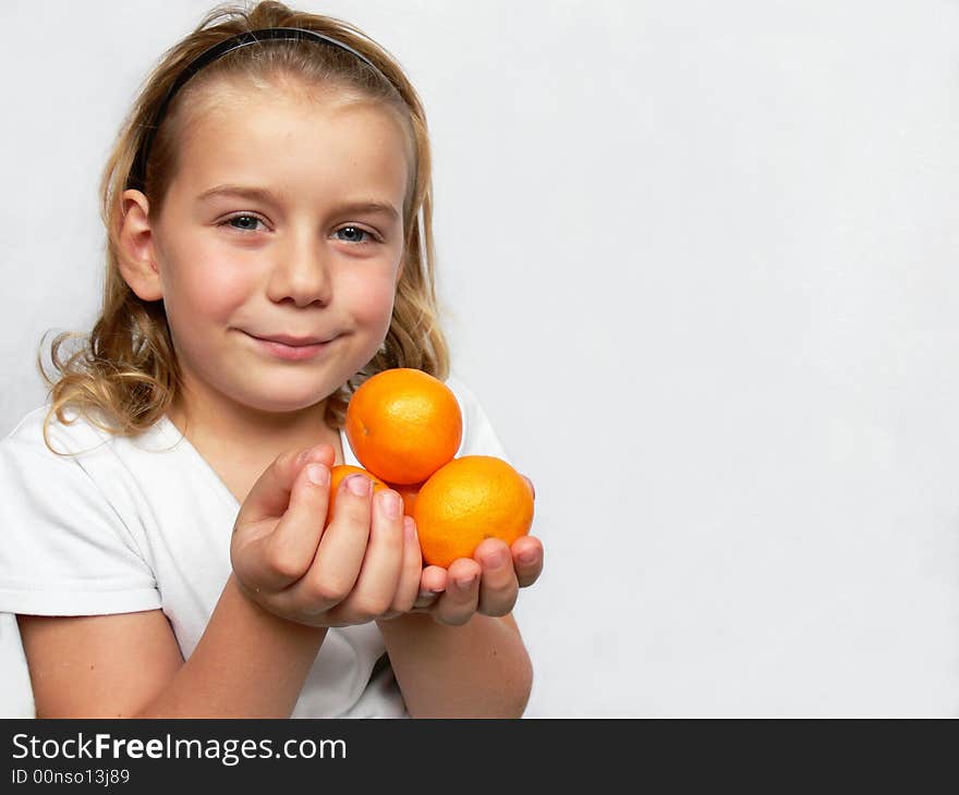 Adorable boy with citrus fruit