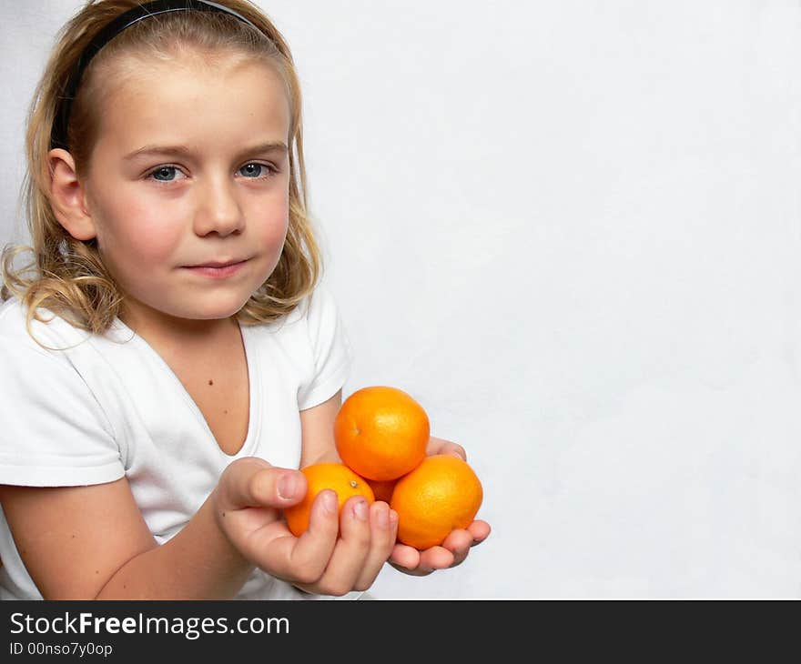 Adorable boy with citrus fruit