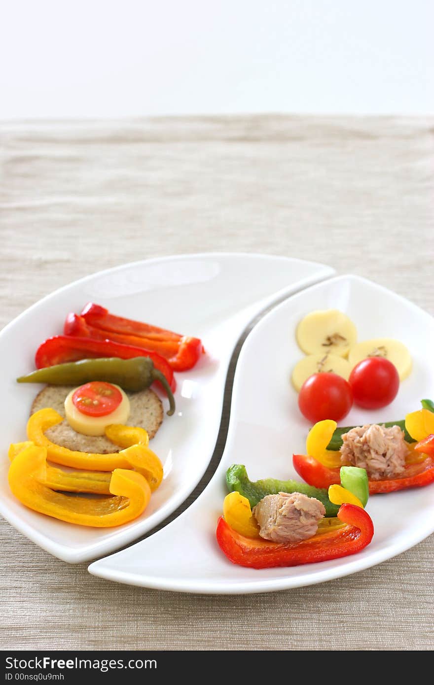 Healthy colorful platter with assorted vegetables on fancy white china. Healthy colorful platter with assorted vegetables on fancy white china