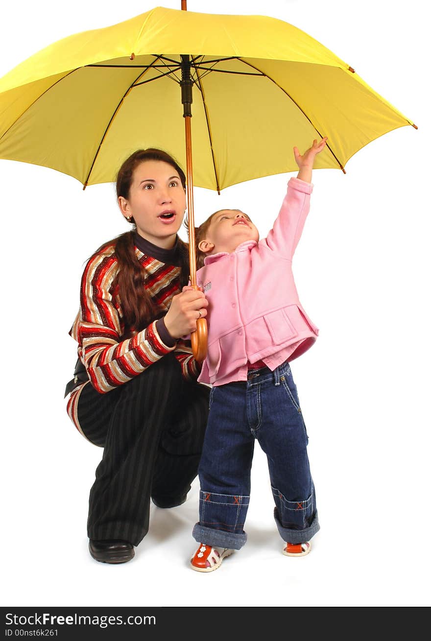 Daughter and mother with yellow umbrella