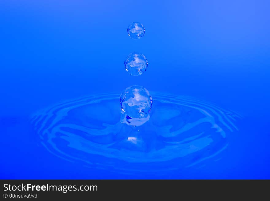 Water drops, on blue background