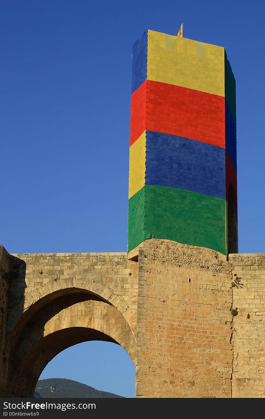 Coloured old gate tower at a medieval town. Coloured old gate tower at a medieval town