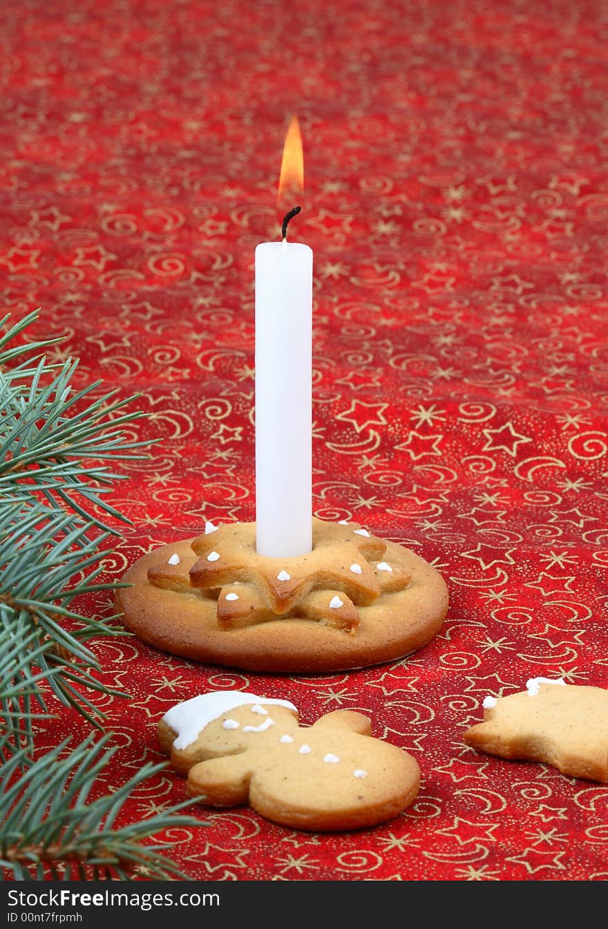 Christmas candlestick, candle and gingerbread