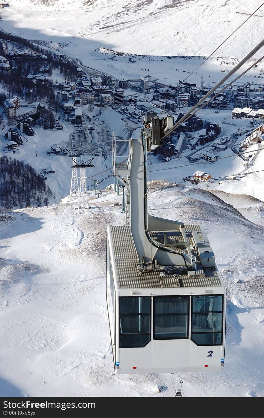 Cervinia mountain resort cable car (Italy); winter season; vertical orientation