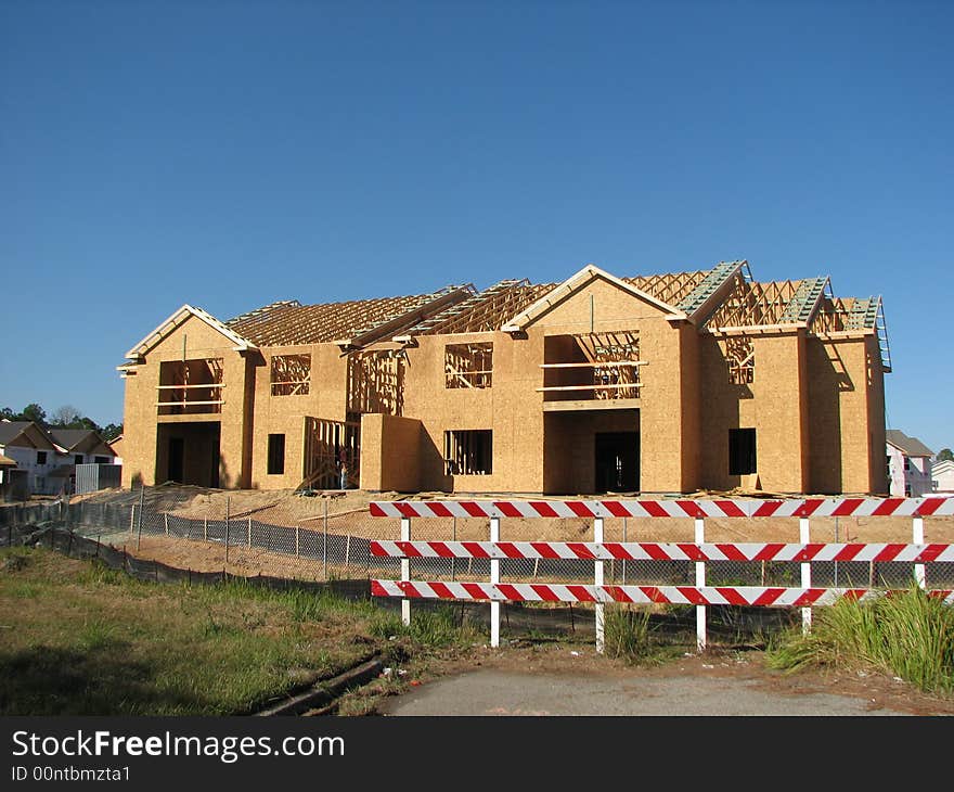 new home building site that has a road block. new home building site that has a road block