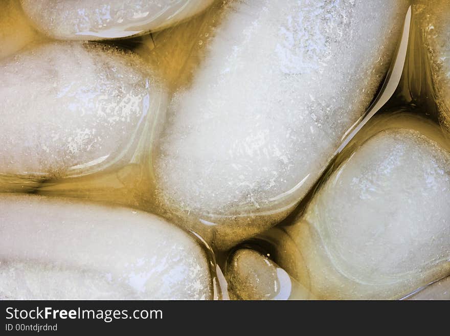 Close up of ice cubes in a glass of iced tea. Close up of ice cubes in a glass of iced tea