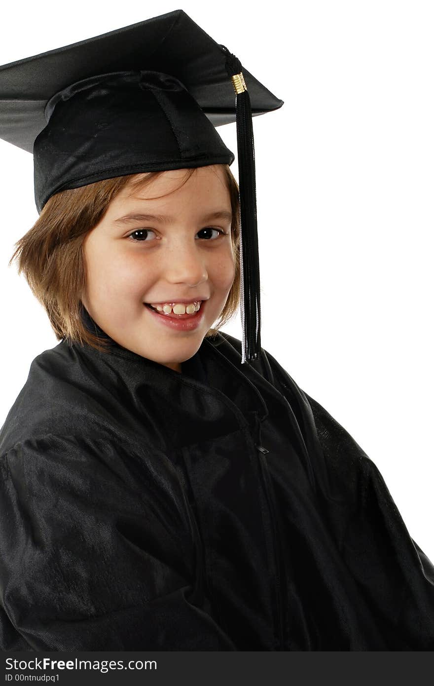 Head and shoulders portrait of a primary student in her graduation cap and gown. Head and shoulders portrait of a primary student in her graduation cap and gown.