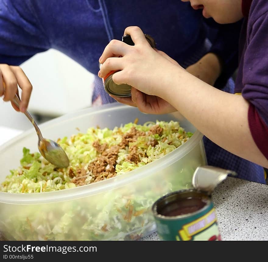 Work in the kitchen, vegetable salad with tuna