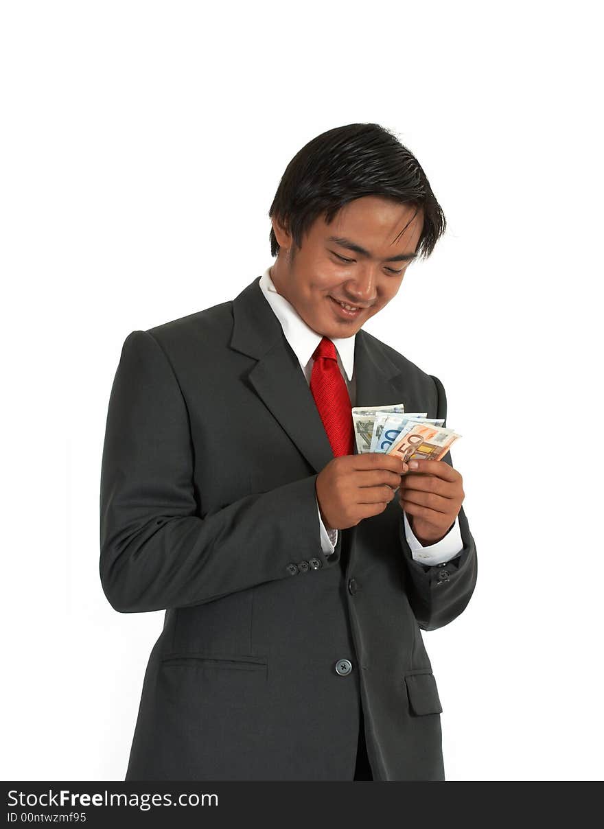 A man counting his money over a white background. A man counting his money over a white background