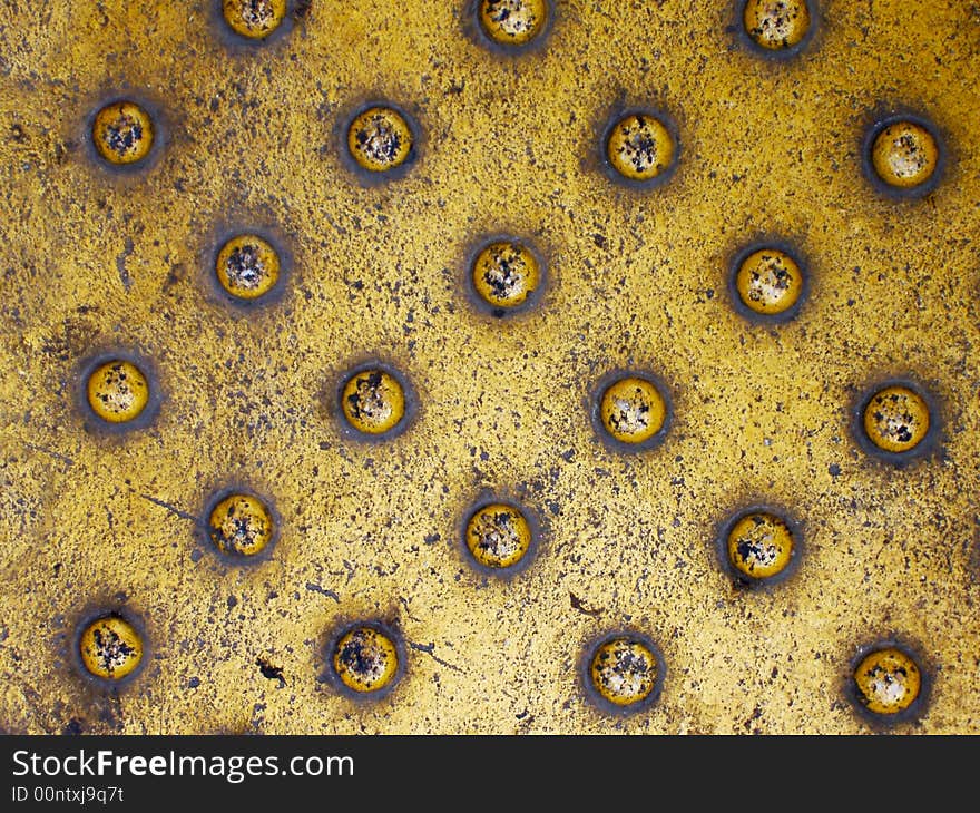 Yellow metal sheet with bumps. Yellow metal sheet with bumps