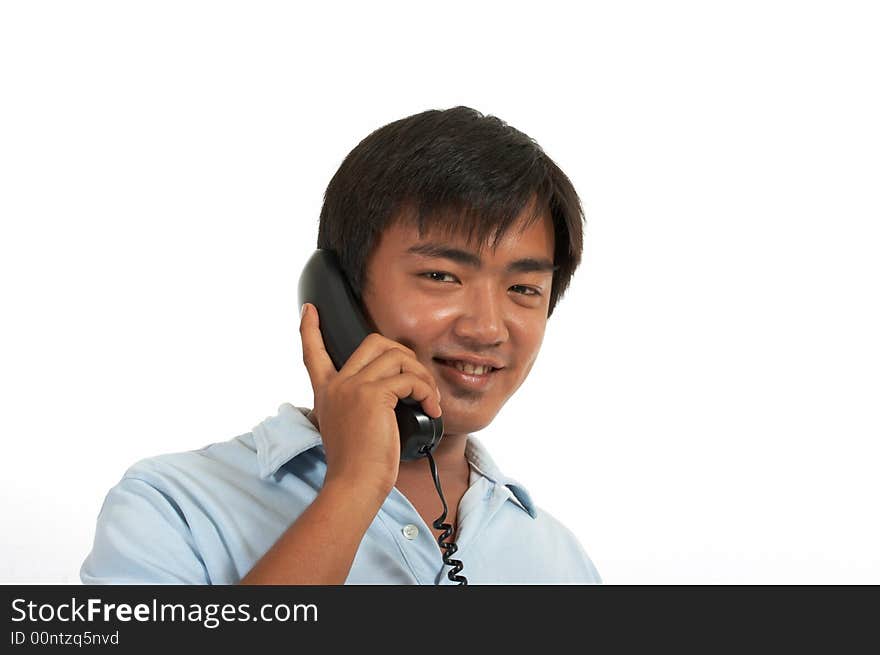 Man talking on a phone over a white background. Man talking on a phone over a white background