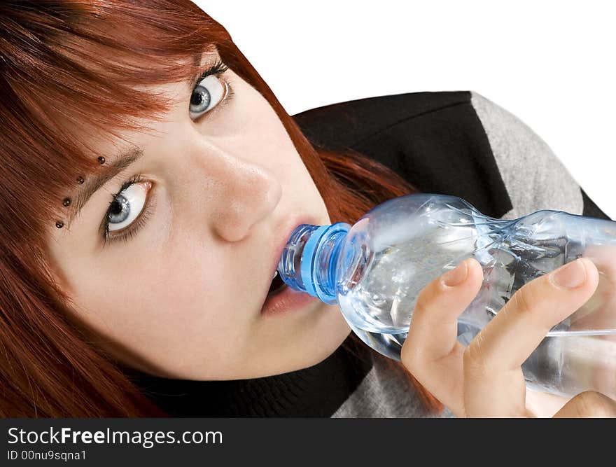 Seductive redhead girl looking at camera and drinking a bottle of water.

Studio shot. Seductive redhead girl looking at camera and drinking a bottle of water.

Studio shot.