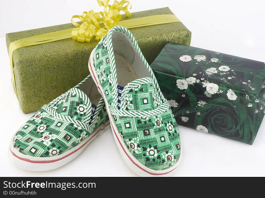 Two Gift Boxes And Green Shoes