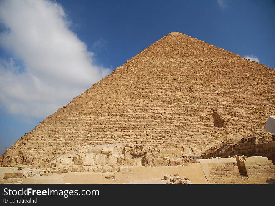 The Pyramid of Giza built for Pharaoh Cheops in the 4th dynasty about 2690 B.C. It is made from limestone from the Mokattam Mountains near Cairo. Its height is 140 m and its lateral length 230 m.