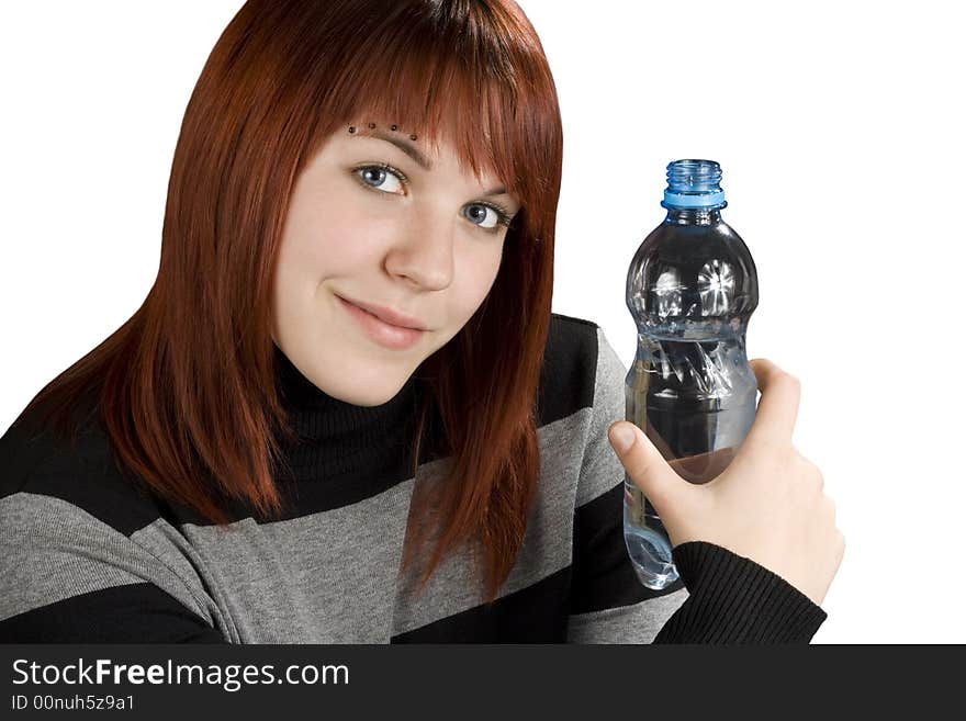 Redhead girl holding water bottle