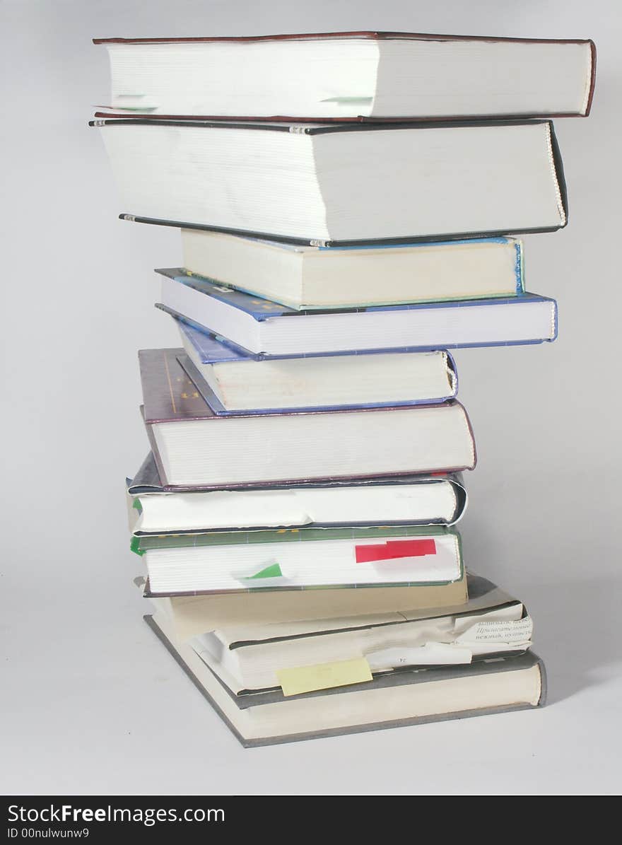 Pile of books on gray background