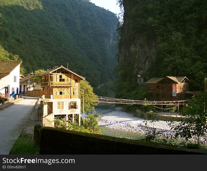 This is a old-style house in the countryside, among mountains, the photo take the morning's scene, very nice!. This is a old-style house in the countryside, among mountains, the photo take the morning's scene, very nice!