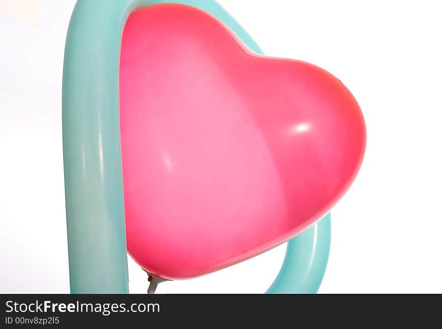 Red heart balloon in the shape of heart