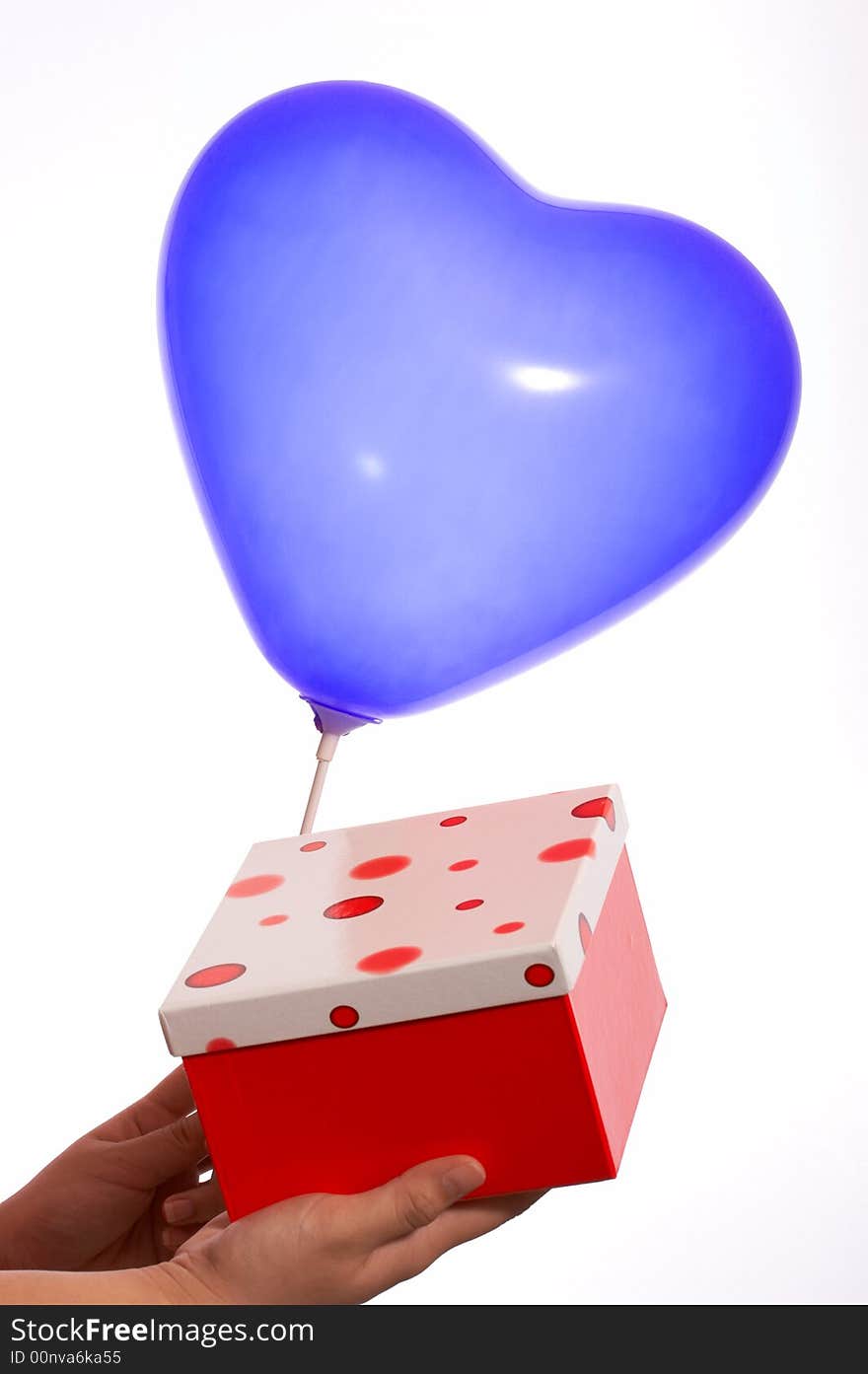 hand holding balloon and polkadot  red gift box