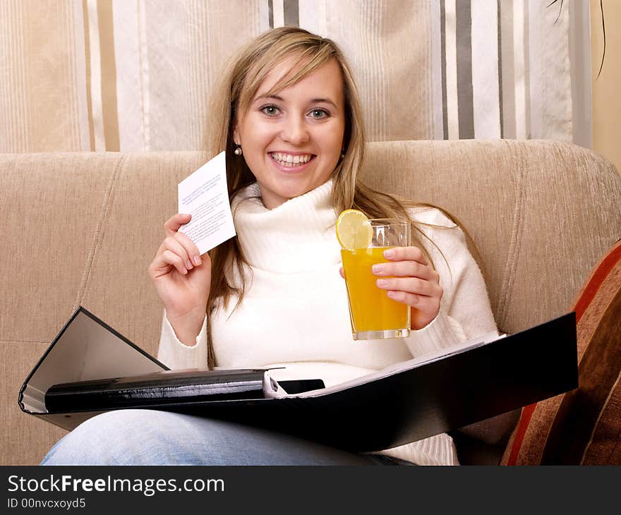 I found it! Happy female student with important card.