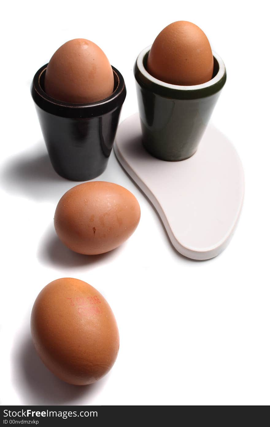 Design and eggs on the white background