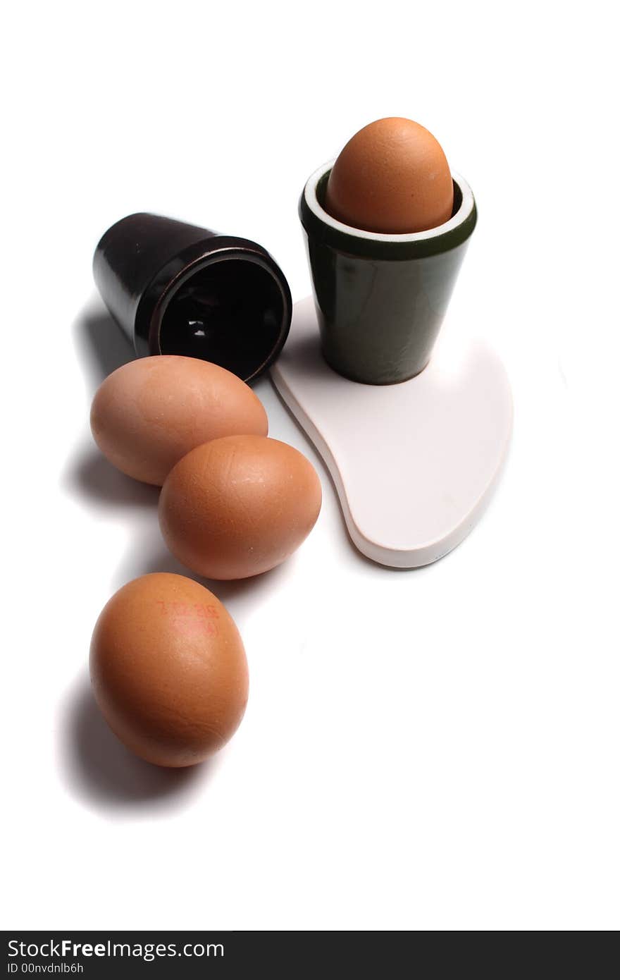 Design and eggs on the white background