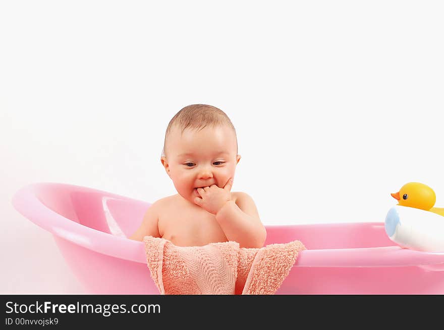 Sweet baby girl in tub on white background. Sweet baby girl in tub on white background