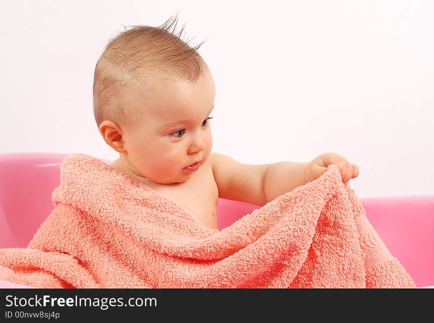 Sweet baby girl in tub on white background. Sweet baby girl in tub on white background