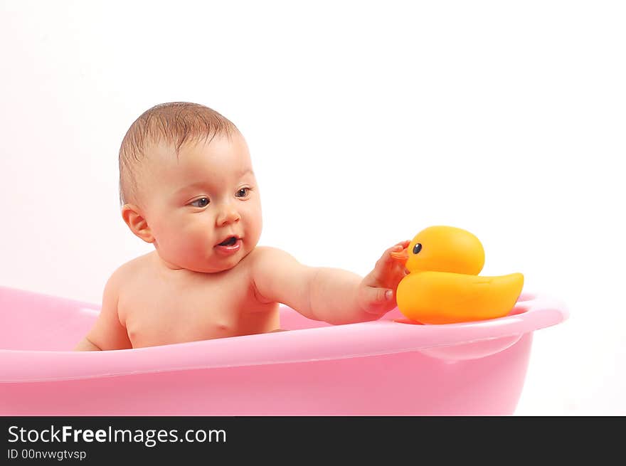 Sweet baby girl in tub on white background. Sweet baby girl in tub on white background