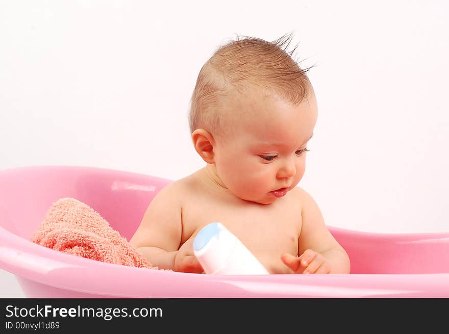 Sweet baby girl in tub on white background. Sweet baby girl in tub on white background