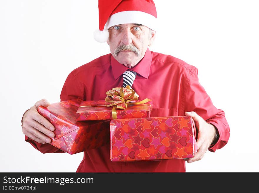 Businessman with Christmas gift and Santa Claus hat. Businessman with Christmas gift and Santa Claus hat.