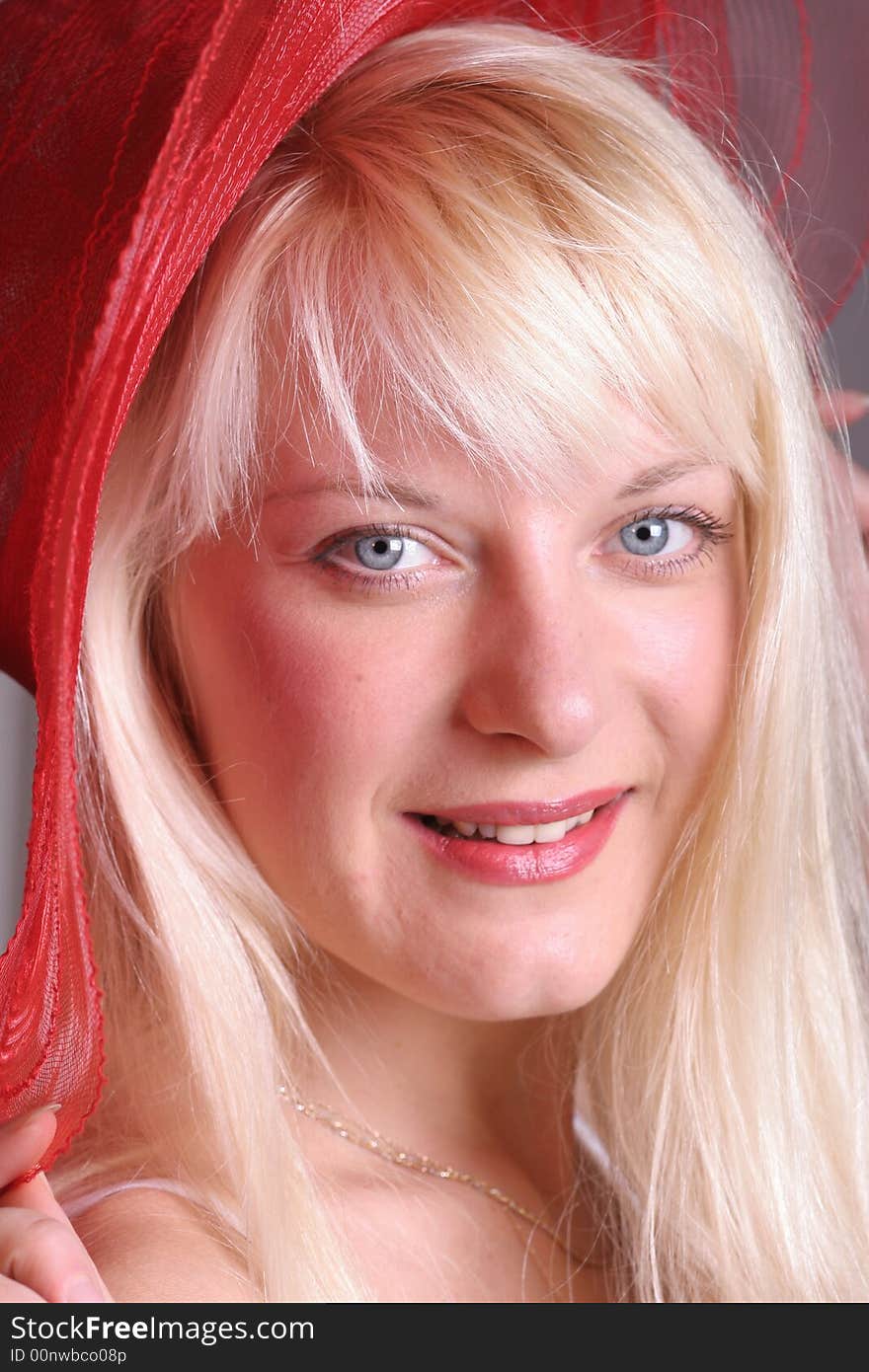 Portrait of a young attractive girl with red hat. Portrait of a young attractive girl with red hat