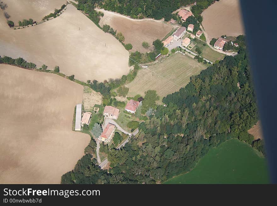 Aerial view of a farm located in the hills at east of Voghera

More info on Voghera http://en.wikipedia.org/wiki/Voghera. Aerial view of a farm located in the hills at east of Voghera

More info on Voghera http://en.wikipedia.org/wiki/Voghera