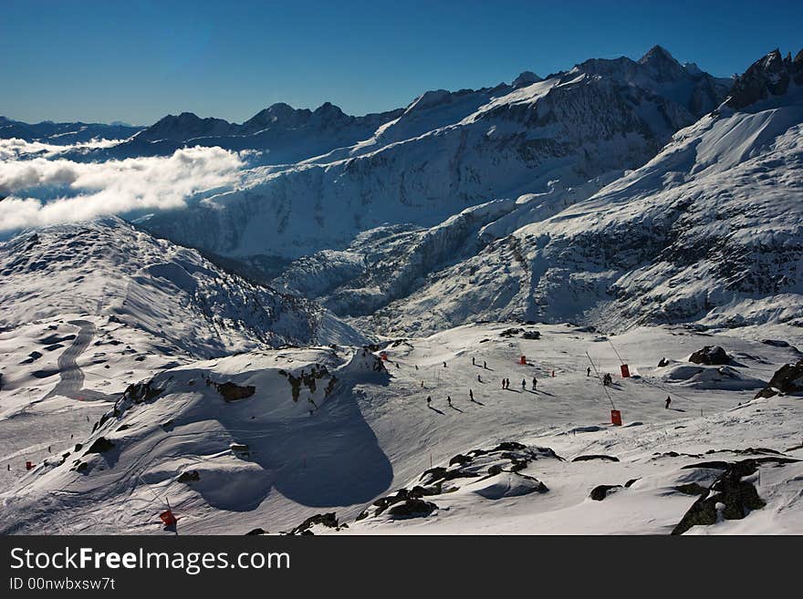 Skying in the Swiss Alps. View from Bettmerhorn ski gondola station, Bettmeralp, Brig Wallis-Valais Switzerland. Skying in the Swiss Alps. View from Bettmerhorn ski gondola station, Bettmeralp, Brig Wallis-Valais Switzerland