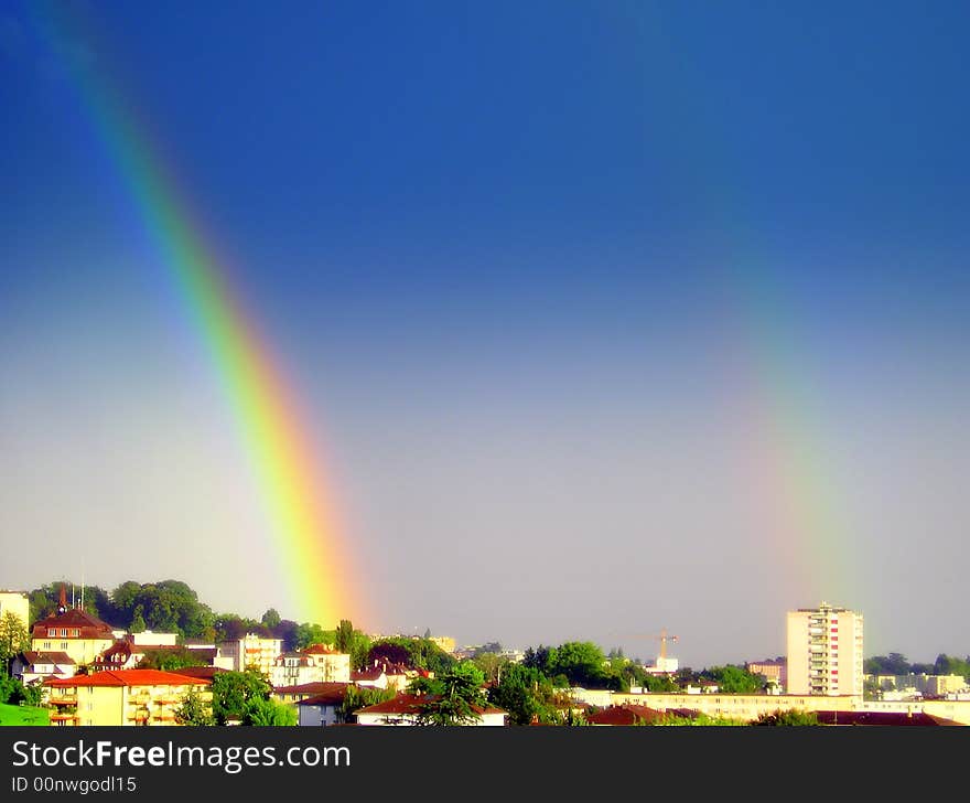 After the rain a beautiful rainbows appear in the sky